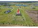 Aerial view of property with red arrow indicating location at 3487 Recurve Cir, Sarasota, FL 34240