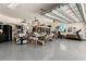 Garage interior with organized storage, work tables, and space for exercise equipment and vehicles at 3487 Recurve Cir, Sarasota, FL 34240
