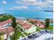 Aerial view of condo complex, showing proximity to the bay and complex parking at 3735 42Nd S Way # J, St Petersburg, FL 33711