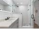 Modern bathroom with elegant vanity and frameless glass shower at 3735 42Nd S Way # J, St Petersburg, FL 33711