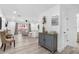 Bright, open floorplan with comfortable seating, light gray floors, and slider to balcony at 3735 42Nd S Way # J, St Petersburg, FL 33711