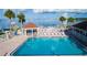 Community pool area with a gazebo, spa, lounge chairs, and beautiful bay views at 3735 42Nd S Way # J, St Petersburg, FL 33711