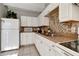 Close-up of the kitchen highlighting the ample counter space and cabinet storage at 3804 E 32Nd Ave, Tampa, FL 33610