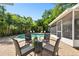 Inviting outdoor space showcasing a pool surrounded by lush greenery and comfortable seating at 3818 W San Miguel St, Tampa, FL 33629
