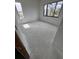 Bright bedroom featuring large windows, offering ample natural light and a clean, modern canvas at 4509 W North A St # 1, Tampa, FL 33609