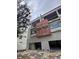 Exterior under construction featuring modern window designs, garage space, and architectural details at 4509 W North A St # 1, Tampa, FL 33609
