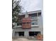 Under-construction exterior view showing the modern design with garage and window placements at 4509 W North A St # 1, Tampa, FL 33609
