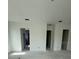 Spacious room with three doorways, offering versatility for customization and seamless transitions at 4509 W North A St # 1, Tampa, FL 33609