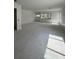 Open-concept living area with large windows, ready for personalization and stylish interior design at 4509 W North A St # 1, Tampa, FL 33609