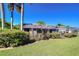 Beautiful backyard featuring a screened lanai and lush landscaping at 4904 Breyer Wood Ct, Valrico, FL 33596