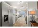 Bright kitchen featuring stainless steel appliances and views of the water at 8632 Fantasia Park Way, Riverview, FL 33578