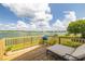 Outdoor patio with a lounge chair and a view of the water at 8632 Fantasia Park Way, Riverview, FL 33578