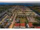 Aerial view of a waterfront residential community showcasing homes and canals at 9980 Eagles Point Cir # 1, Port Richey, FL 34668