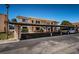 Condominium with covered parking, stone facade, and balconies at 9980 Eagles Point Cir # 1, Port Richey, FL 34668