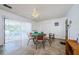 Bright recreational room with a game table and access to a pool at 9980 Eagles Point Cir # 1, Port Richey, FL 34668