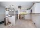 Spacious kitchen with tiled floors and window for natural light ready to be renovated at 9980 Eagles Point Cir # 1, Port Richey, FL 34668