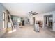 Spacious living area with tile floors, natural light, and endless possibilities for personalized design at 9980 Eagles Point Cir # 1, Port Richey, FL 34668