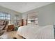 Comfortable bedroom with carpet, natural lighting, and well-placed furnishings at 110 E Saint Lucia Loop, Apollo Beach, FL 33572