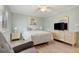 Relaxing bedroom features a comfortable bed, dresser, and coastal-themed decor at 110 E Saint Lucia Loop, Apollo Beach, FL 33572