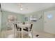 Inviting dining area with a modern table set and stylish decor at 110 E Saint Lucia Loop, Apollo Beach, FL 33572