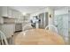 Efficient kitchen with white cabinets and stainless steel appliances at 110 E Saint Lucia Loop, Apollo Beach, FL 33572