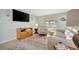 Cozy living room with modern decor and a comfortable armchair at 110 E Saint Lucia Loop, Apollo Beach, FL 33572
