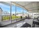 Relaxing screened-in porch perfect for enjoying the outdoors at 110 E Saint Lucia Loop, Apollo Beach, FL 33572