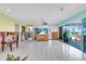 Living room with sliding glass doors at 11674 Grove St, Seminole, FL 33772