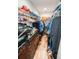 Walk-in closet with custom shelving, wood floors, and ample storage at 12335 Yellow Rose Cir, Riverview, FL 33569