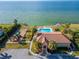 Aerial shot of community amenities featuring a pool, playground and beachfront access at 1408 Alhambra Dr, Apollo Beach, FL 33572