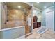 Spacious bathroom boasts a glass shower and dark wood vanity with dual sinks at 1408 Alhambra Dr, Apollo Beach, FL 33572