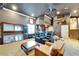 Leisure space featuring a bar, theater seating, and unique wall decorations at 1408 Alhambra Dr, Apollo Beach, FL 33572