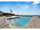 A tranquil community pool with ocean views, lounge seating, and a convenient ladder for easy access at 1408 Alhambra Dr, Apollo Beach, FL 33572