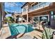Screened in-ground pool and patio with covered seating area at 1408 Alhambra Dr, Apollo Beach, FL 33572