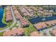 Wide aerial showcasing the neighborhood's ponds, pools, and community at 16 Franklin S Ct # A, St Petersburg, FL 33711