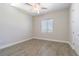 Bedroom featuring hardwood floors, neutral paint, and a ceiling fan at 16 Franklin S Ct # A, St Petersburg, FL 33711
