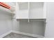 Walk in closet with custom shelving for optimal storage at 16 Franklin S Ct # A, St Petersburg, FL 33711