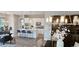 Inviting living room with an open floor plan, seamless flow to kitchen and dining area at 16 Franklin S Ct # A, St Petersburg, FL 33711