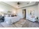 Inviting main bedroom featuring a neutral color scheme, tray ceiling, and modern furnishings at 16 Franklin S Ct # A, St Petersburg, FL 33711