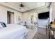 Bright main bedroom offering a calm atmosphere, ensuite bathroom, and private balcony at 16 Franklin S Ct # A, St Petersburg, FL 33711