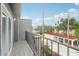 View from the balcony featuring tiled floors and a black railing, offering an outdoor living space at 170 E Davis Blvd, Tampa, FL 33606