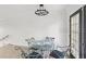 Dining room featuring a stylish chandelier and door to private patio at 170 E Davis Blvd, Tampa, FL 33606