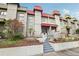Attractive townhouse showcases a two-story layout with distinct architectural details and lush greenery at 170 E Davis Blvd, Tampa, FL 33606