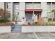 Charming townhouse exterior with multi-level entrance, offering curb appeal and a welcoming entrance at 170 E Davis Blvd, Tampa, FL 33606