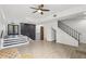 Bright living area with sleek design, modern staircase, and views to the dining area at 170 E Davis Blvd, Tampa, FL 33606