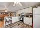 Modern kitchen featuring white cabinets, stainless steel appliances, and sleek countertops at 1710 7Th Sw St # 95, Ruskin, FL 33570