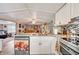 Bright kitchen overlooking dining and living area featuring stainless steel appliances at 1710 7Th Sw St # 95, Ruskin, FL 33570