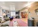 Open living room with cozy seating, adjacent dining area, and ample natural light at 1710 7Th Sw St # 95, Ruskin, FL 33570