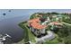 Waterfront condo with community tennis court, boat slips, and lush landscaping at 1810 Mariner Dr # 207, Tarpon Springs, FL 34689