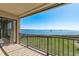 View from condo balcony with water views and clear blue sky at 1810 Mariner Dr # 207, Tarpon Springs, FL 34689